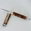 Jr. Emperor, rollerball, black titanium and rhodium metal and finished with amboyna barrels